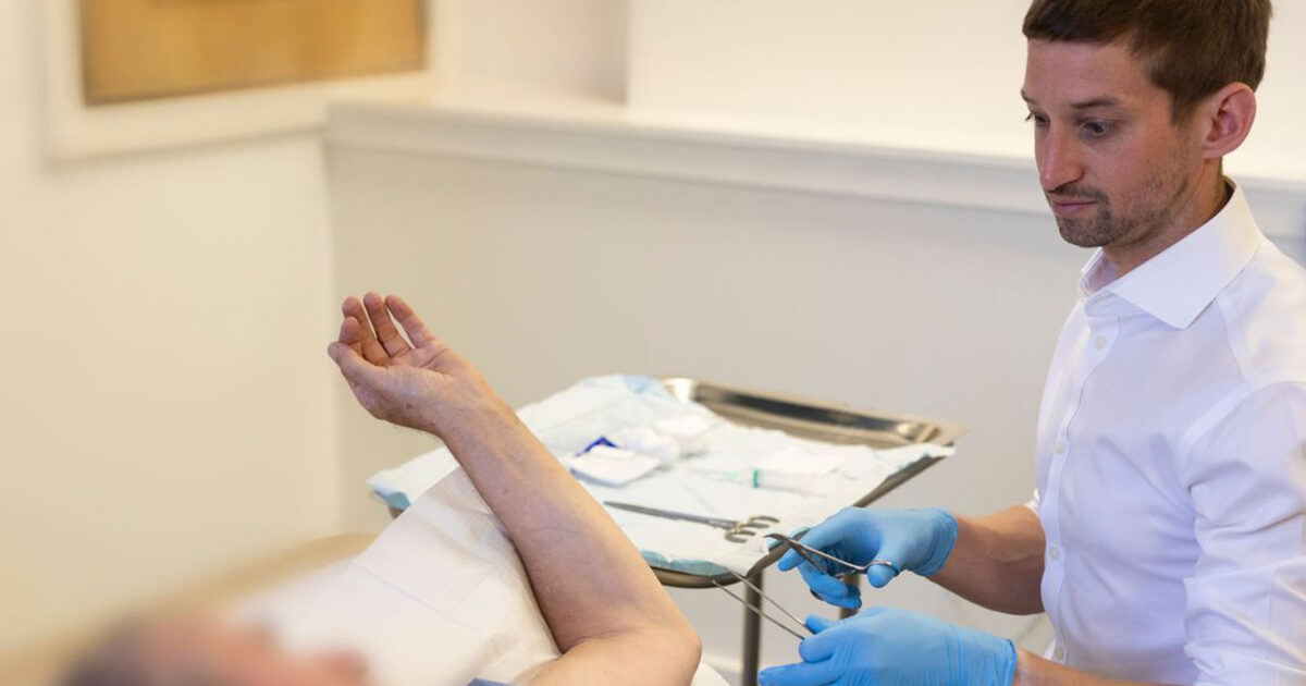 Dr Ciaran Foley of Sliabh Medical Practice, Waterford with a patient
